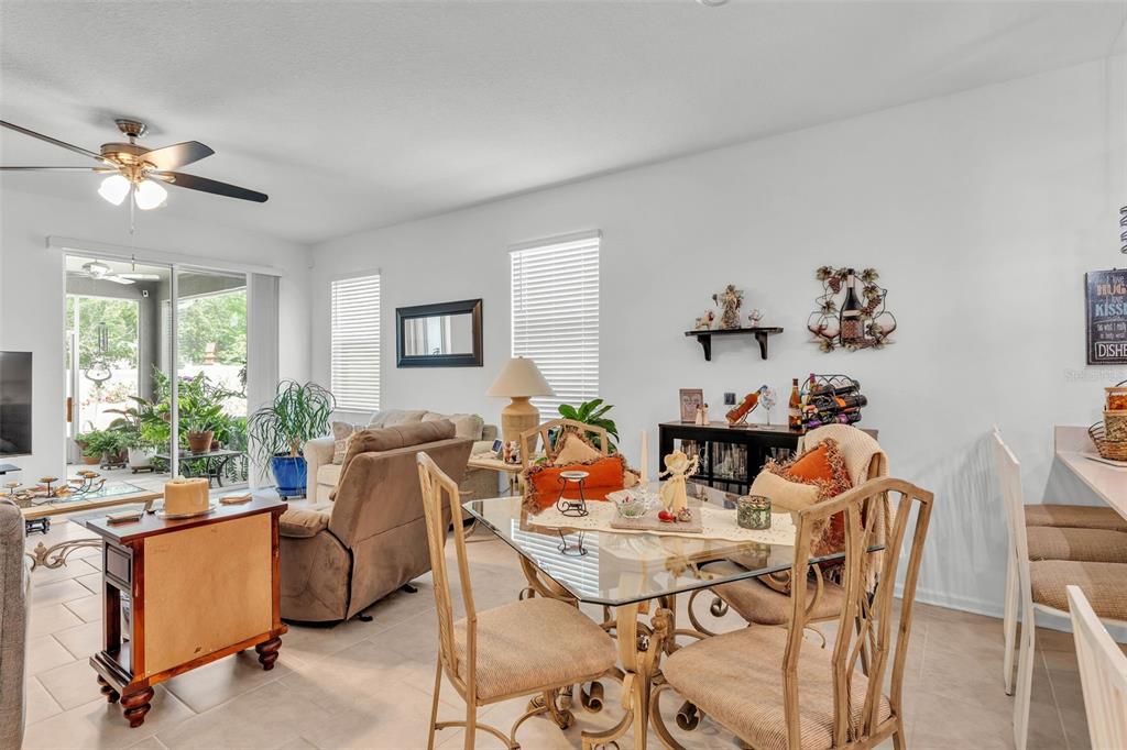 280 Pershing Street Bartow, FL 33830 - Photo 14 of 41 a view of a dining room with furniture and a chandelier