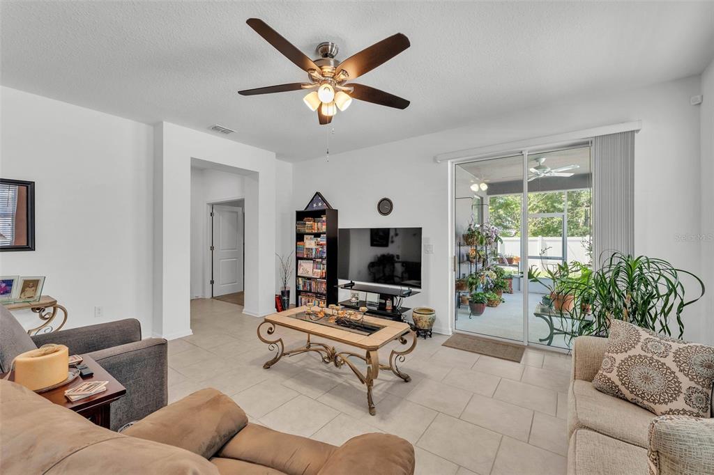 280 Pershing Street Bartow, FL 33830 - Photo 16 of 41 a living room with furniture and a large window