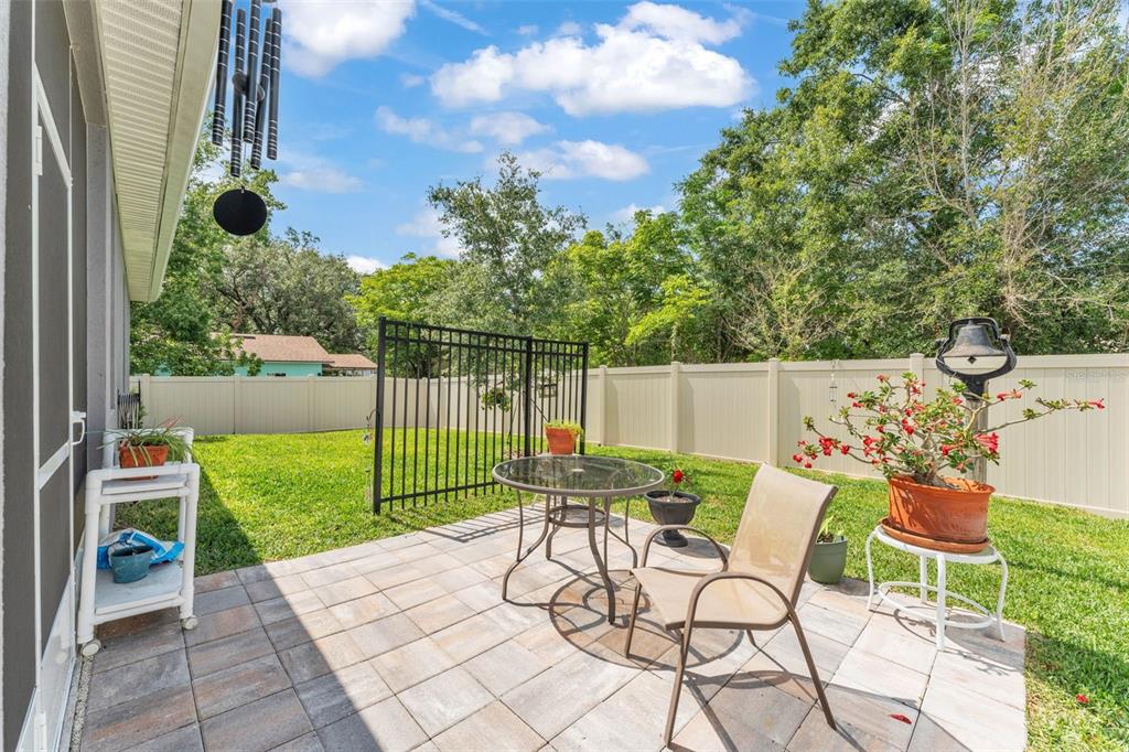 280 Pershing Street Bartow, FL 33830 - Photo 41 of 41 a view of a chairs and table in the back yard of the house