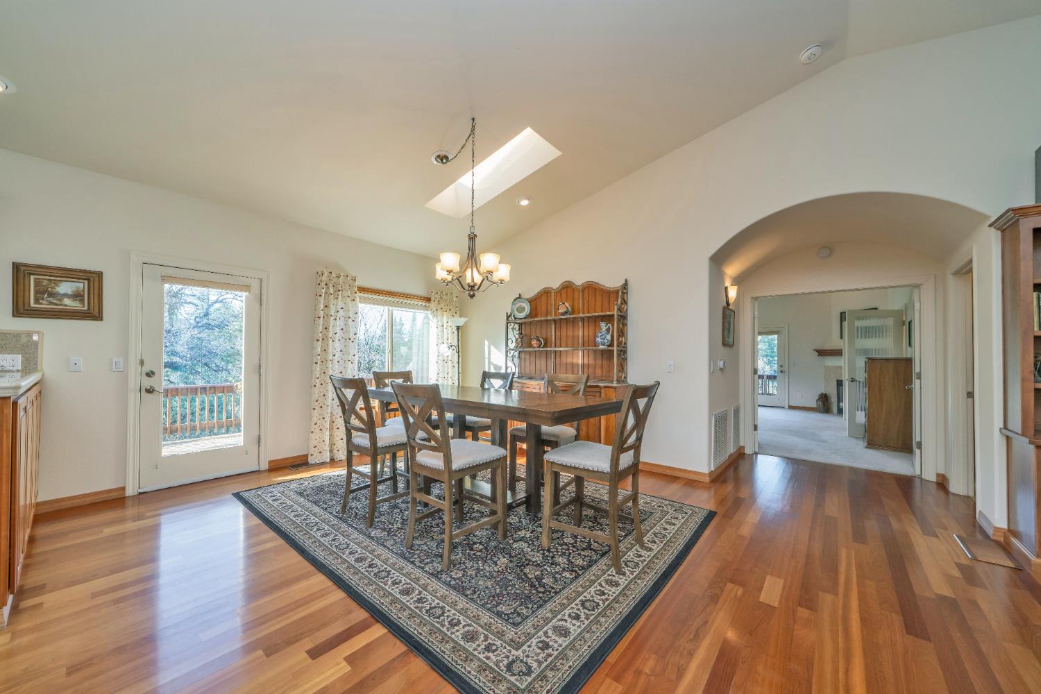 6510 Sly Park Road Placerville, CA 95667 - Photo 14 of 50 a view of a dining room with furniture and wooden floor