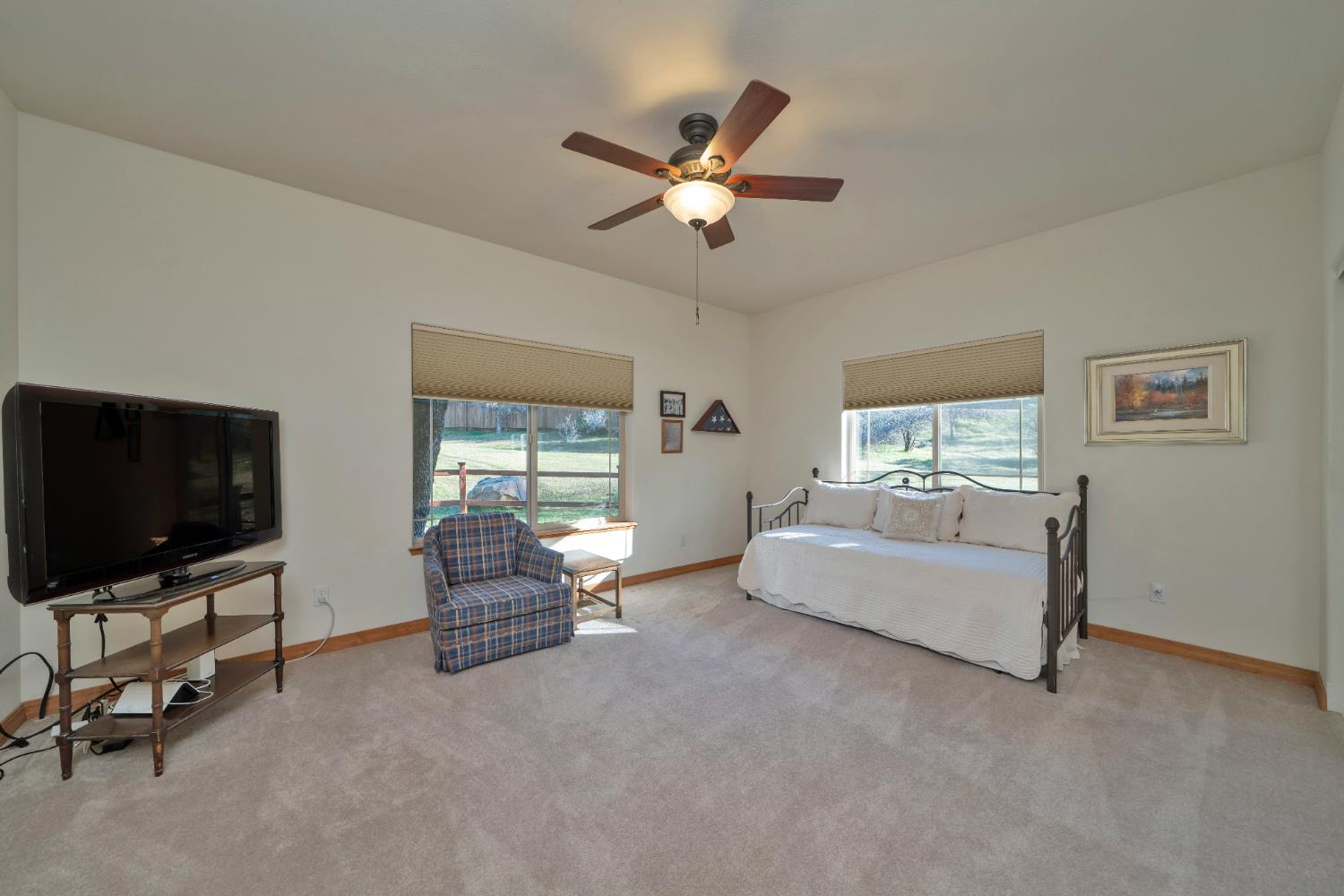 6510 Sly Park Road Placerville, CA 95667 - Photo 33 of 50 a living room with furniture and a flat screen tv