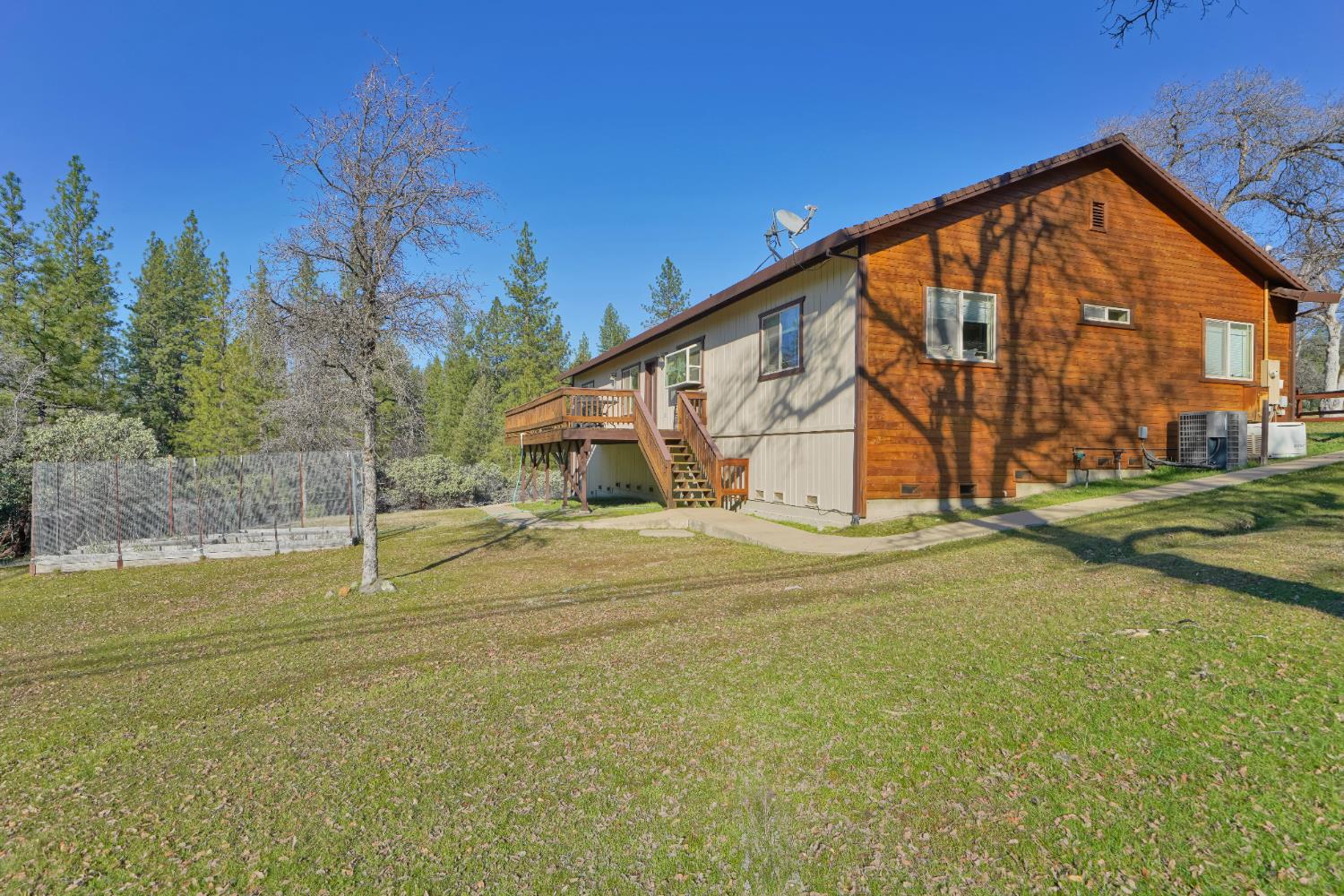 6510 Sly Park Road Placerville, CA 95667 - Photo 37 of 50 a view of an house with backyard and trees
