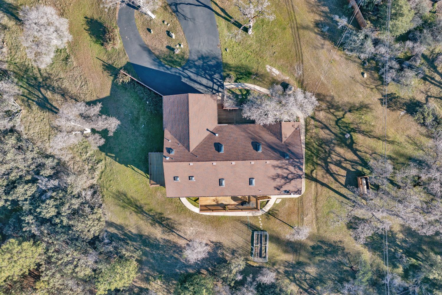 6510 Sly Park Road Placerville, CA 95667 - Photo 44 of 50 an aerial view of a house with a yard and large tree