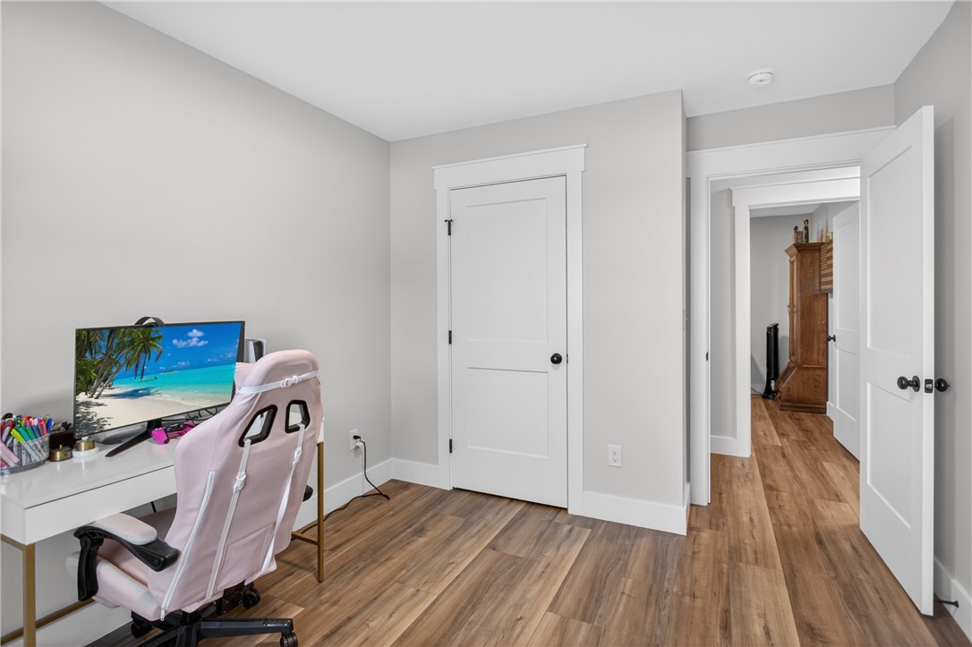 106 Bolt Road Townville, SC 29689 - Photo 22 of 33 A versatile space features durable plank flooring, ideal for a home office or creative pursuits.