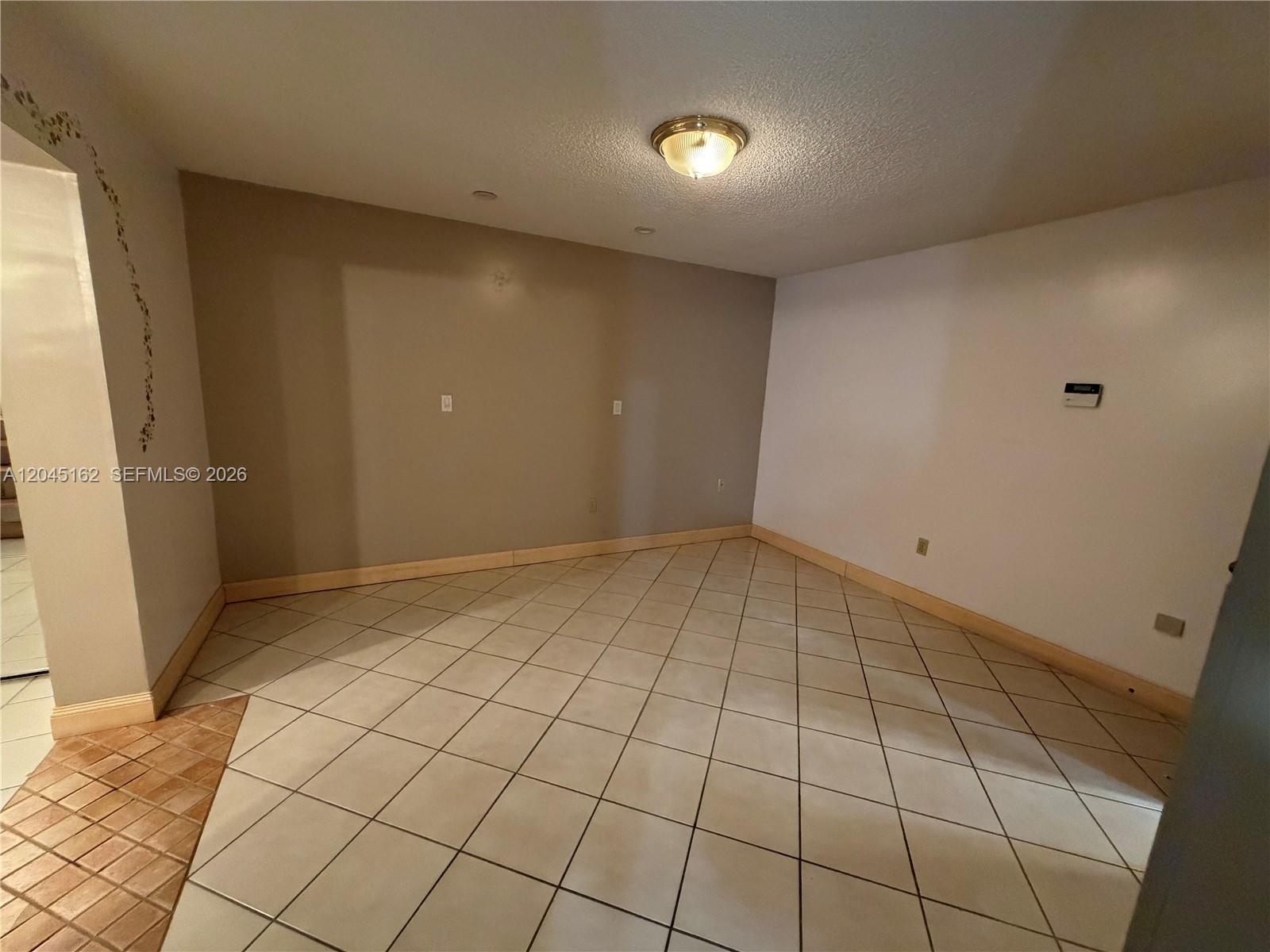 3262 Southwest 139th Place Miami, FL 33175 - Photo 17 of 36 a view of an empty room and window