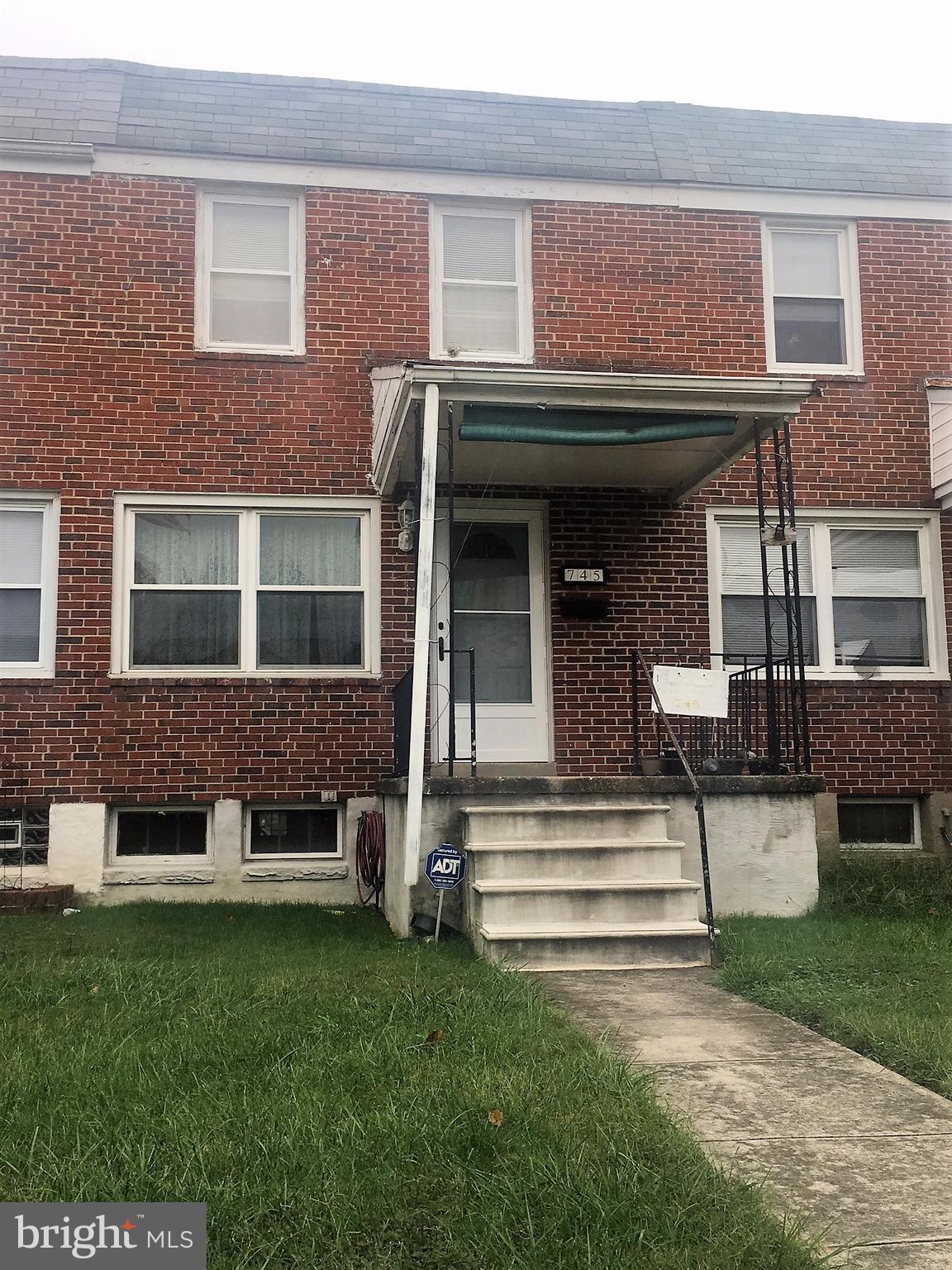745 Aldworth Road Baltimore, MD 21222 - Photo 2 of 11 a view of a house with a yard and sitting area