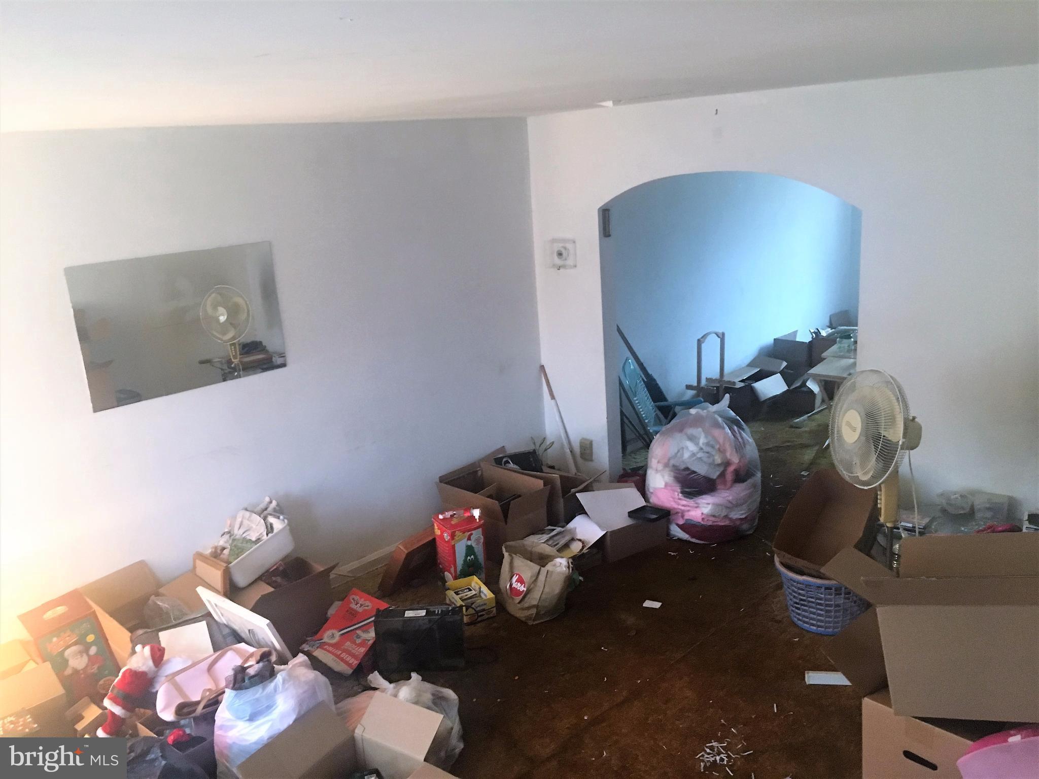 745 Aldworth Road Baltimore, MD 21222 - Photo 3 of 11 a living room with furniture