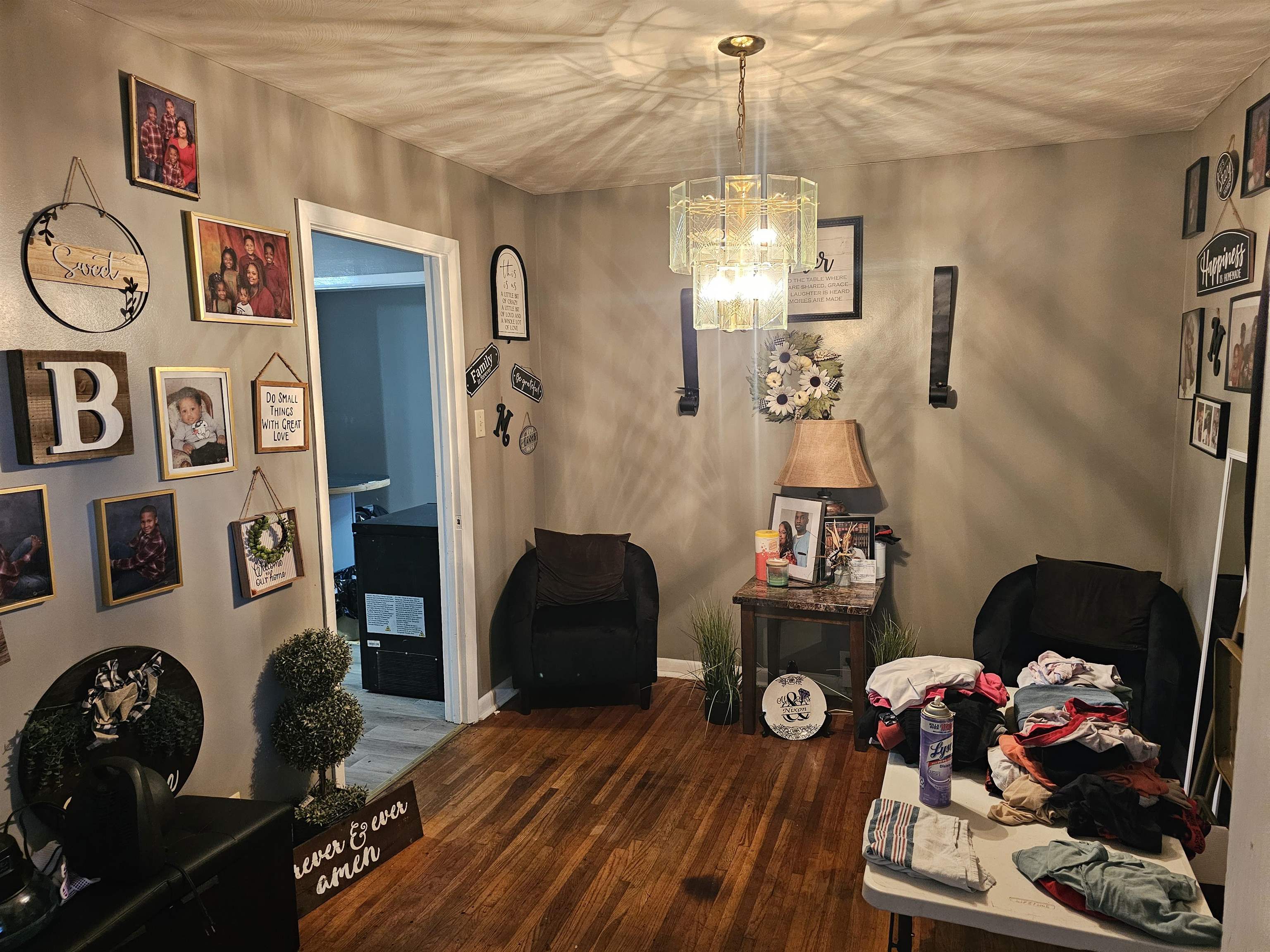 488 Perkins Street Ripley, TN 38063 - Photo 15 of 23 a bedroom with a bed and wooden floor