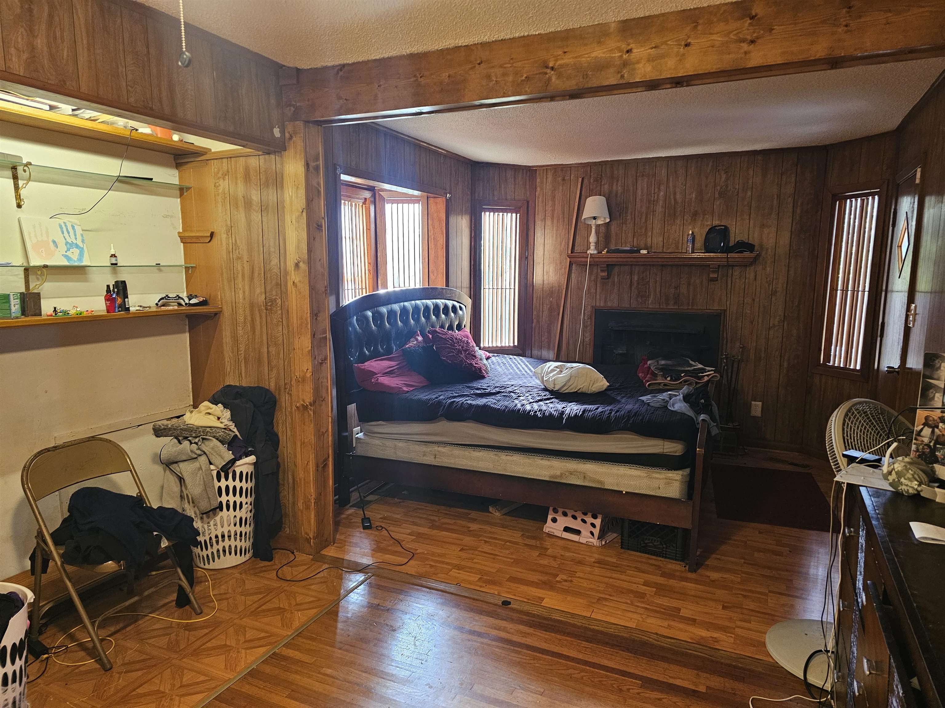 488 Perkins Street Ripley, TN 38063 - Photo 17 of 23 a living room with furniture and a wooden floor