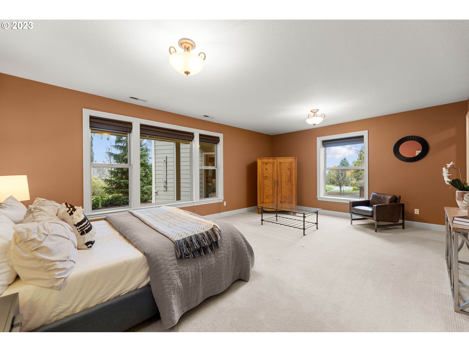 6405 Northwest 202nd Circle Ridgefield, WA 98642 - Photo 35 of 45 a bedroom with bed and a large window