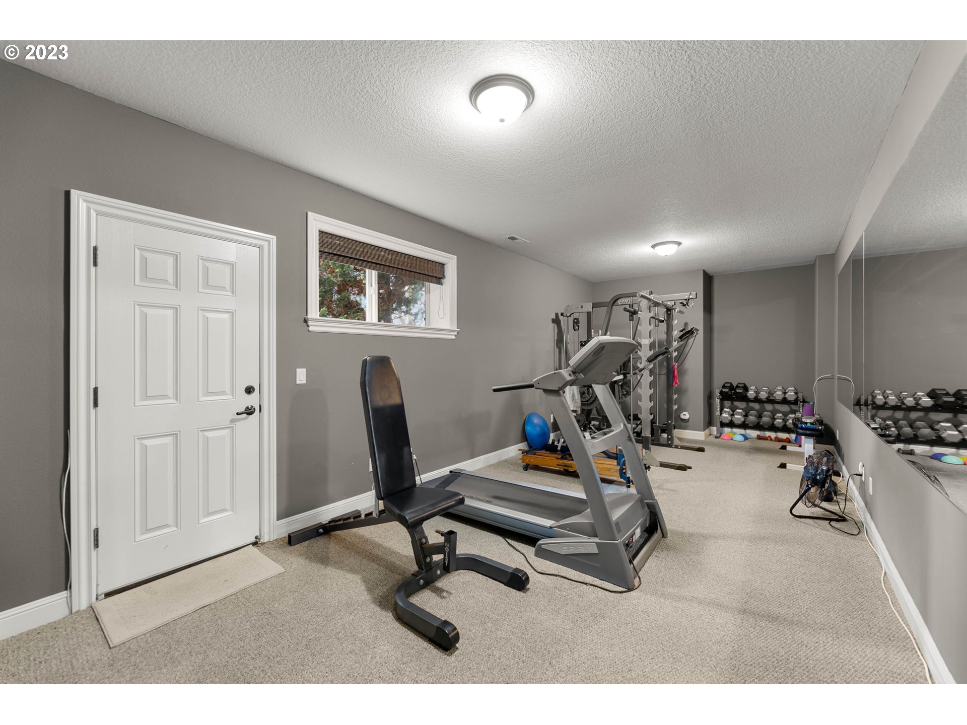 6405 Northwest 202nd Circle Ridgefield, WA 98642 - Photo 37 of 45 a view of a room with gym equipment