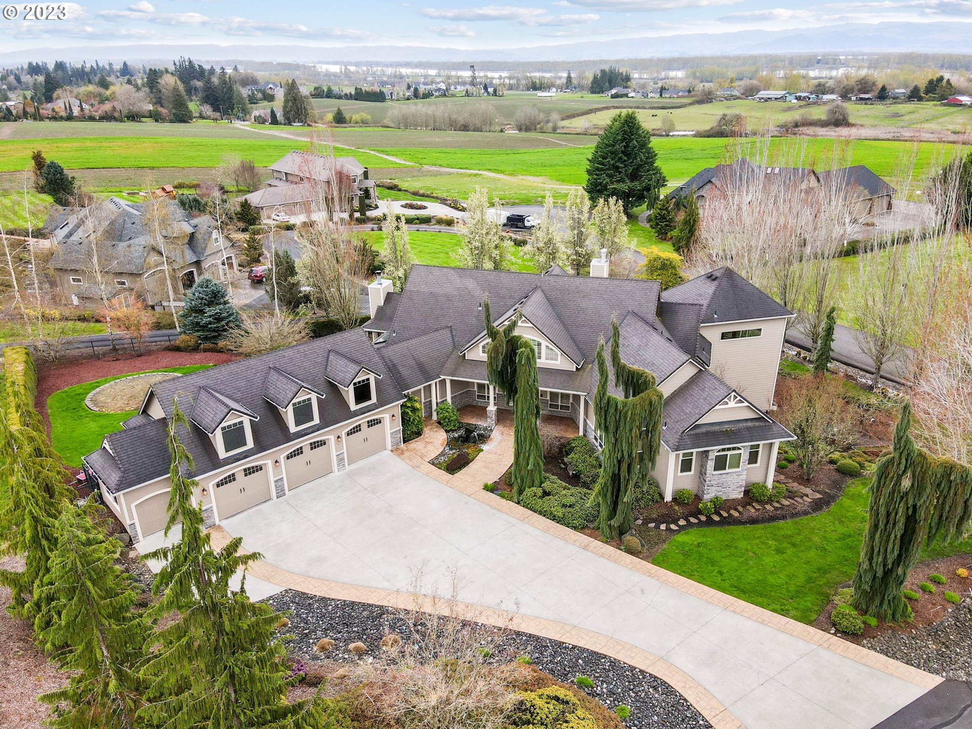 6405 Northwest 202nd Circle Ridgefield, WA 98642 - Photo 45 of 45 an aerial view of a house with outdoor space swimming pool and outdoor space