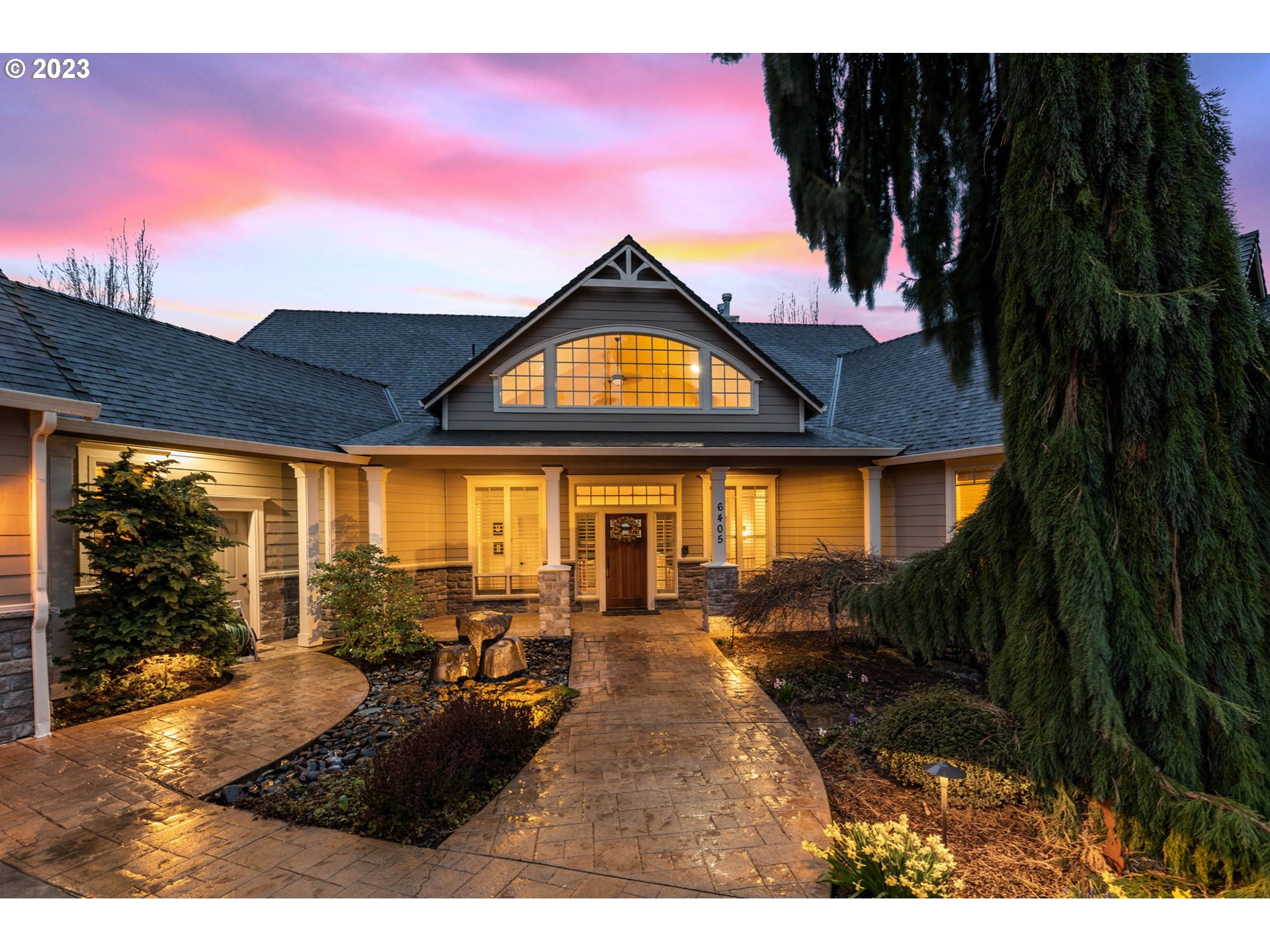 6405 Northwest 202nd Circle Ridgefield, WA 98642 - Photo 5 of 45 a view of a house with a porch
