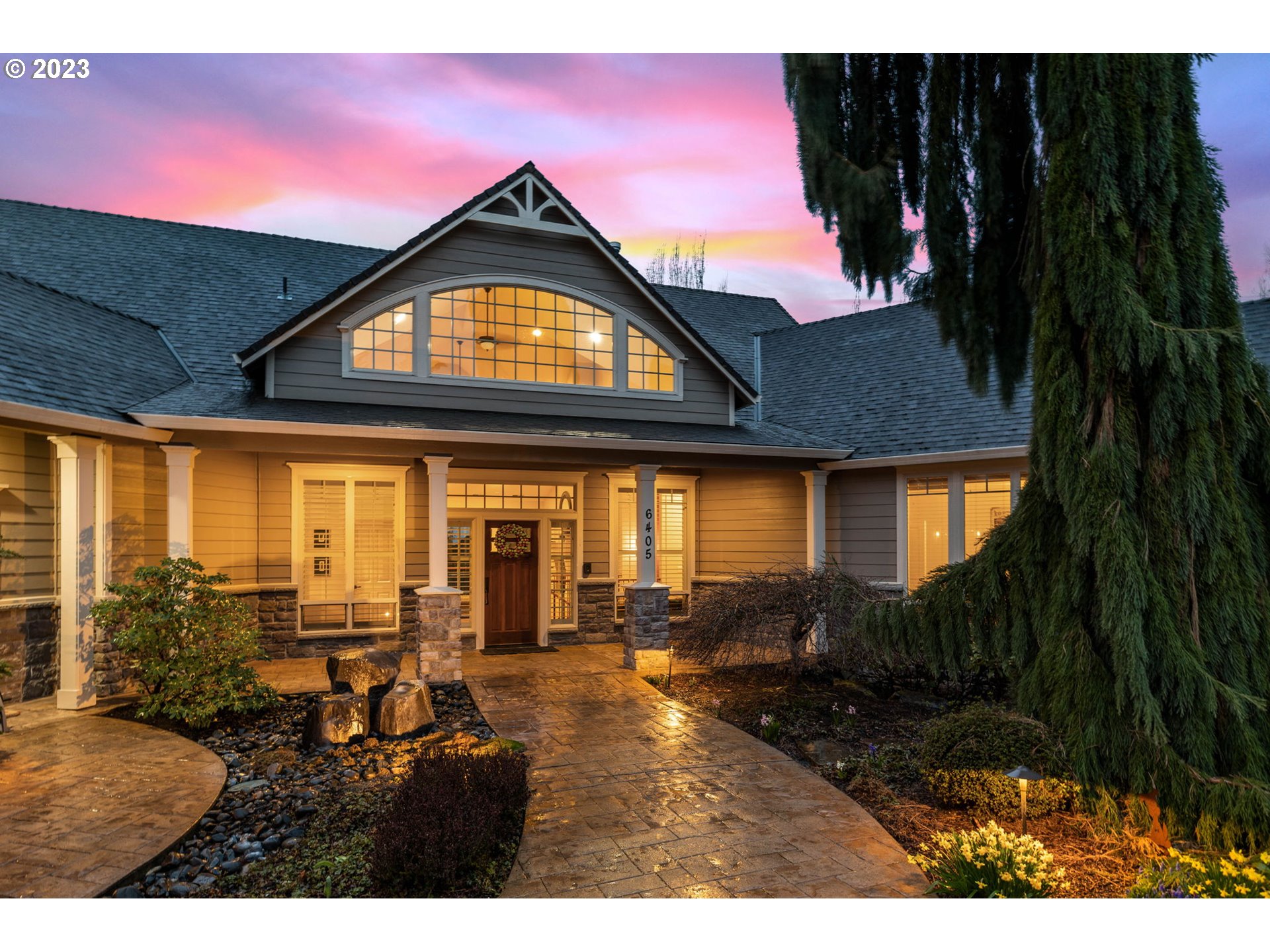 6405 Northwest 202nd Circle Ridgefield, WA 98642 - Photo 6 of 45 a view of a house with a porch