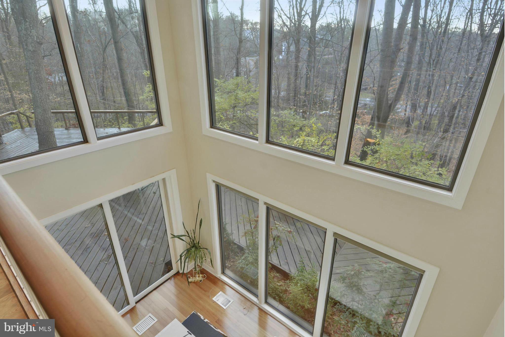 11256 Oakton Road Oakton, VA 22124 - Photo 17 of 29 a view of a balcony with wooden floor and furniture