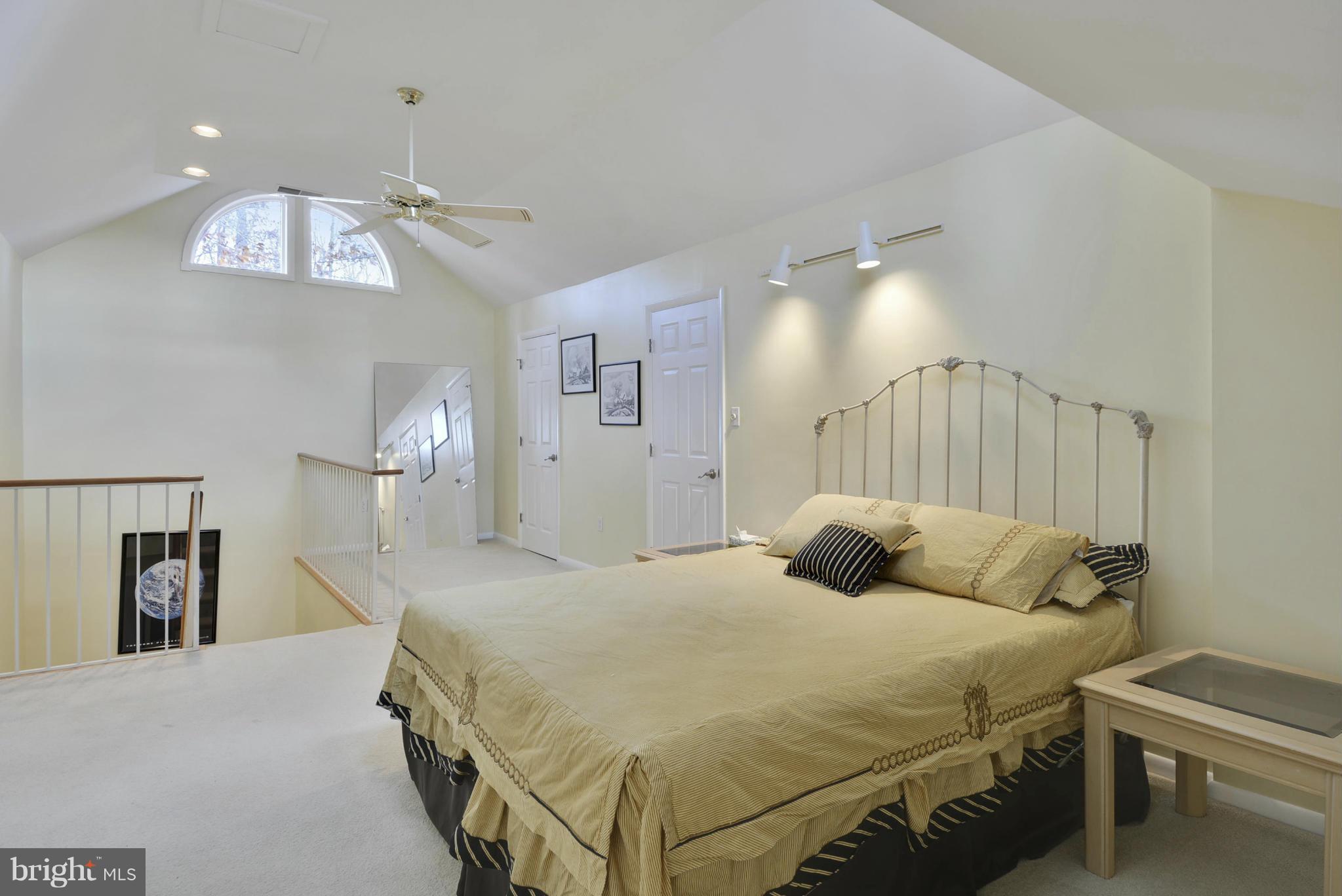 11256 Oakton Road Oakton, VA 22124 - Photo 19 of 29 a bedroom with a bed window and a lamp