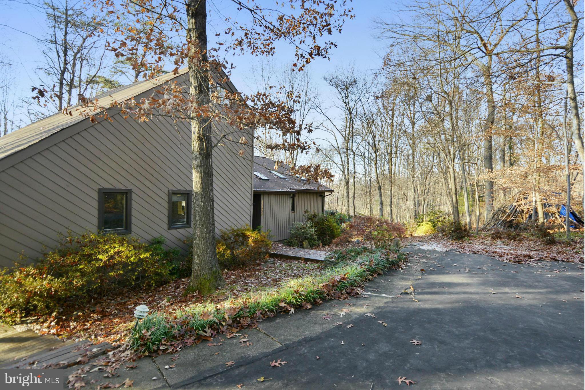 11256 Oakton Road Oakton, VA 22124 - Photo 25 of 29 a front view of a house with garden
