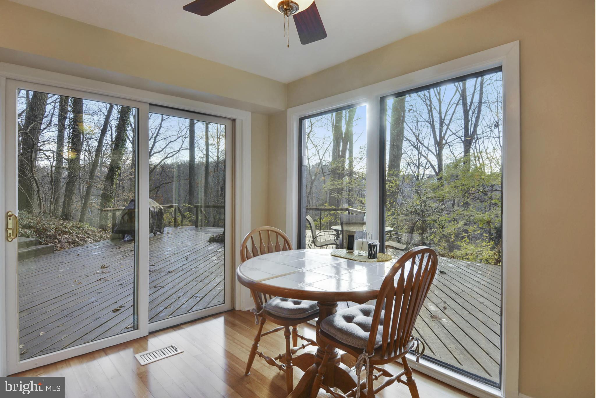 11256 Oakton Road Oakton, VA 22124 - Photo 6 of 29 a view of a dining room with furniture window and wooden floor