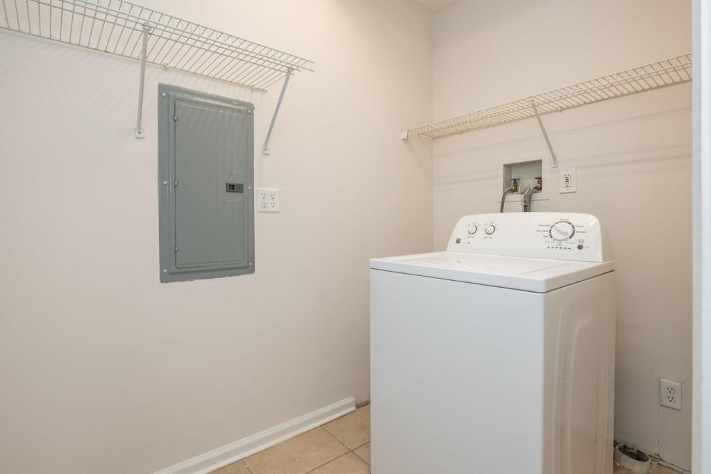 1392 Lively Ridge Road Northeast Atlanta, GA 30329 - Photo 24 of 42 a utility room with dryer and washer