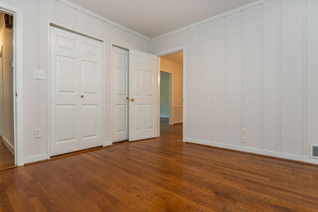 1392 Lively Ridge Road Northeast Atlanta, GA 30329 - Photo 26 of 42 a view of an empty room with wooden floor