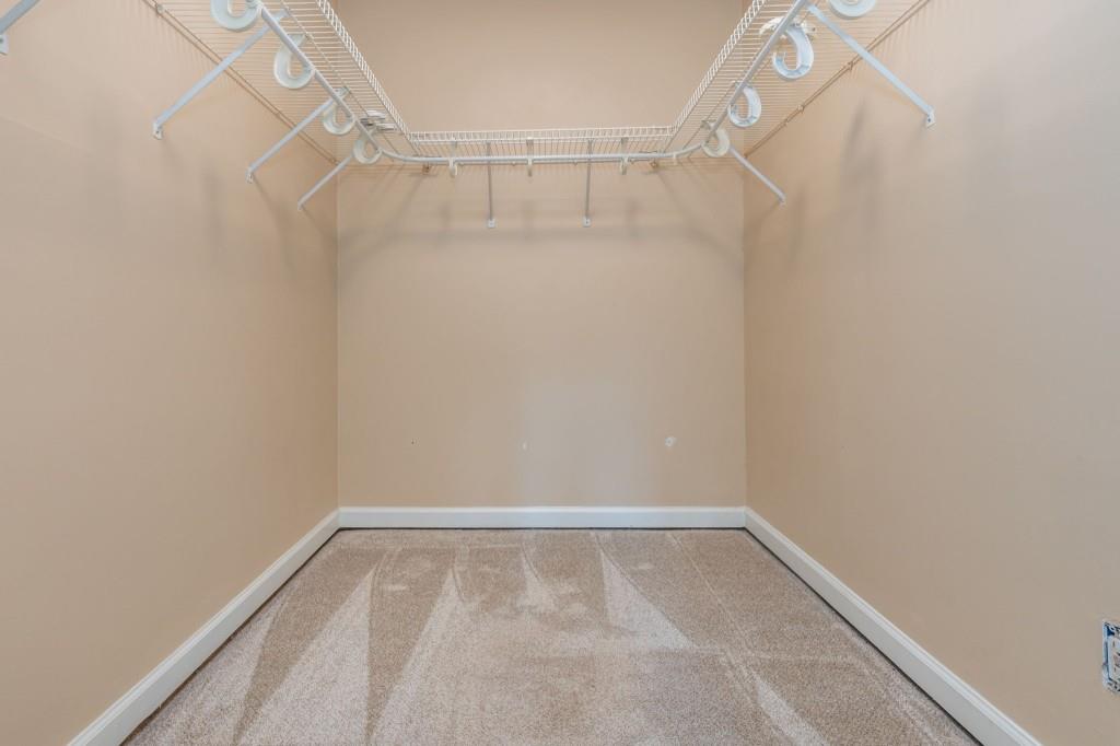 1392 Lively Ridge Road Northeast Atlanta, GA 30329 - Photo 33 of 42 a view of a room with racks on the wall