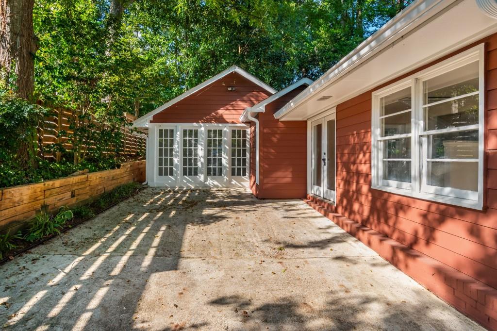 1392 Lively Ridge Road Northeast Atlanta, GA 30329 - Photo 4 of 42 a front view of a house with a yard