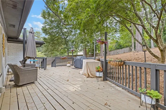 a view of roof deck with patio