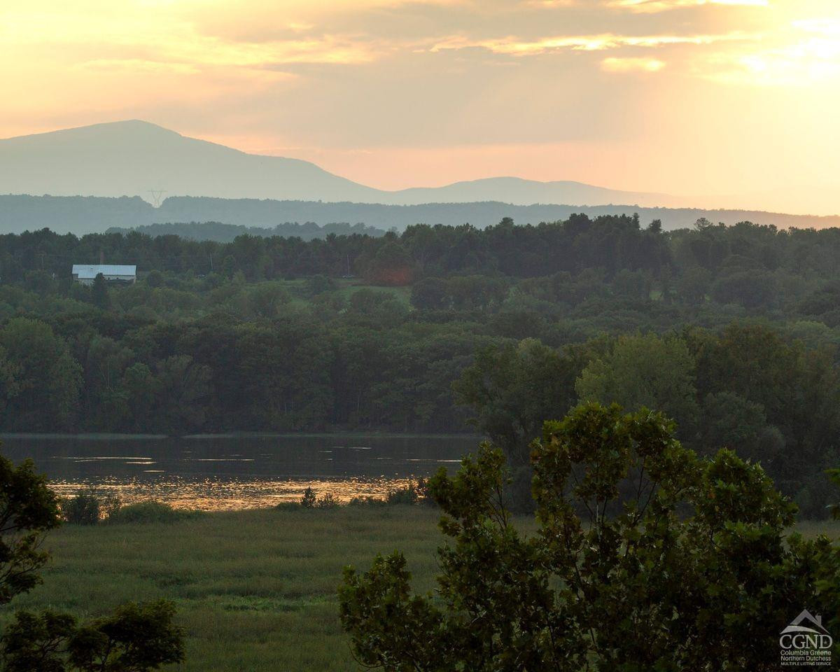 a view of a lake in middle of the town