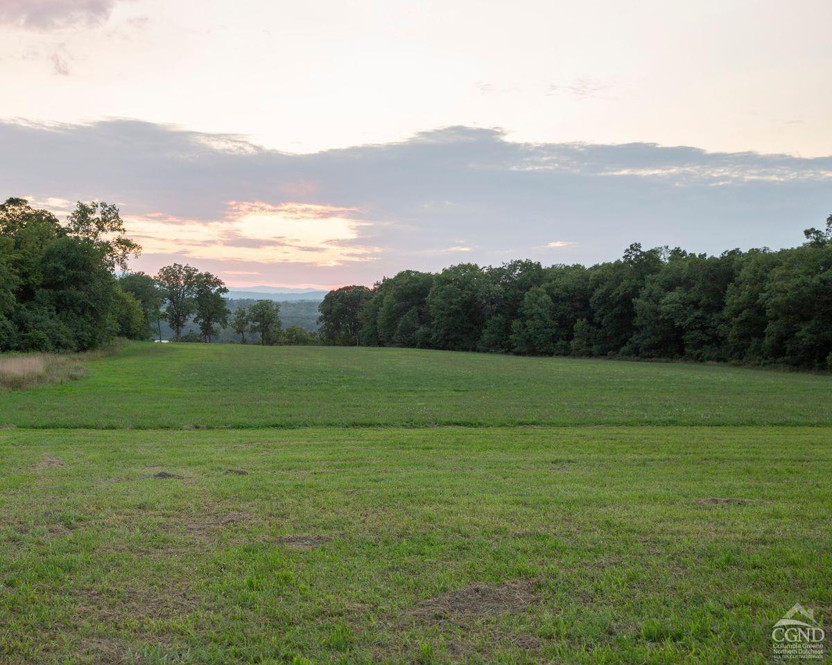 6881 Rod And Gun Road Hudson, NY 12534 - Photo 14 of 27 a view of a field with an ocean
