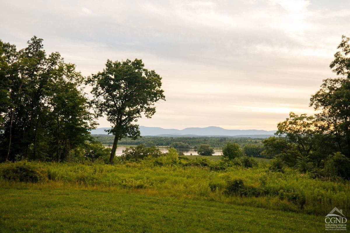 6881 Rod And Gun Road Hudson, NY 12534 - Photo 27 of 27 a view of a lake with houses