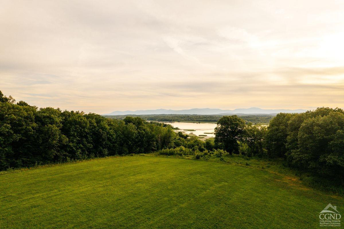 6881 Rod And Gun Road Hudson, NY 12534 - Photo 4 of 27 a view of an ocean from a yard