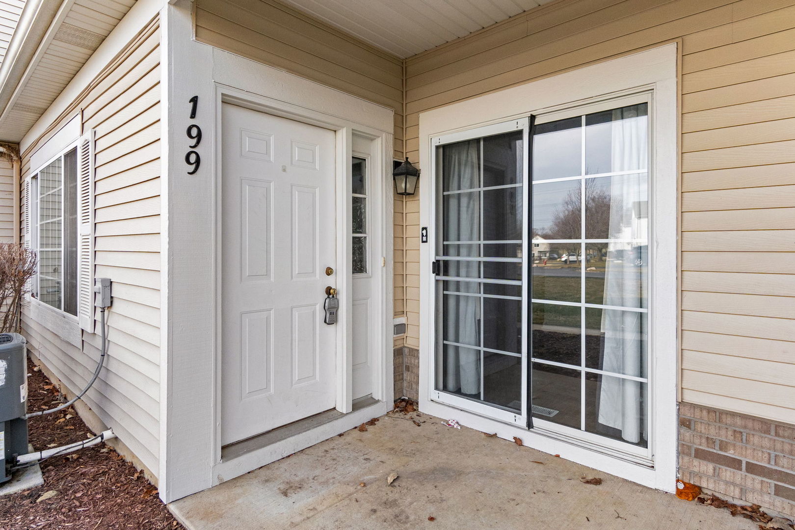 199 North Oakhurst Drive, Unit 199 Aurora, IL 60504 - Photo 3 of 25 a view of front door