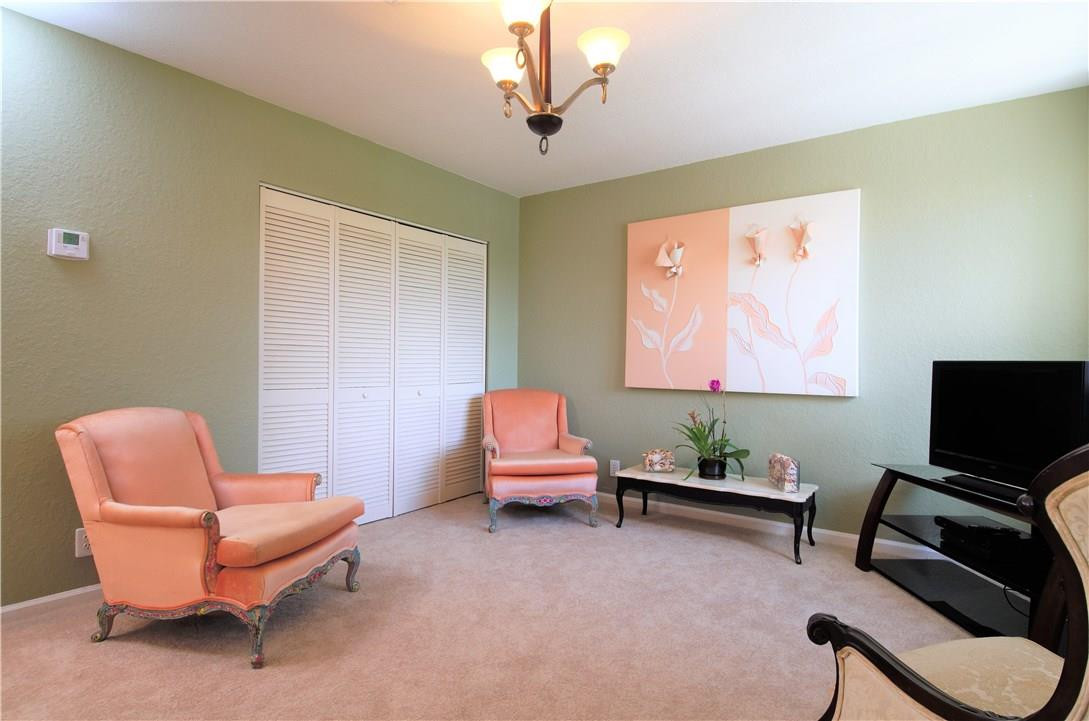 17401 Sunset Drive Southwest Ranches, FL 33331 - Photo 24 of 45 a living room with furniture a air conditioner vent and a window