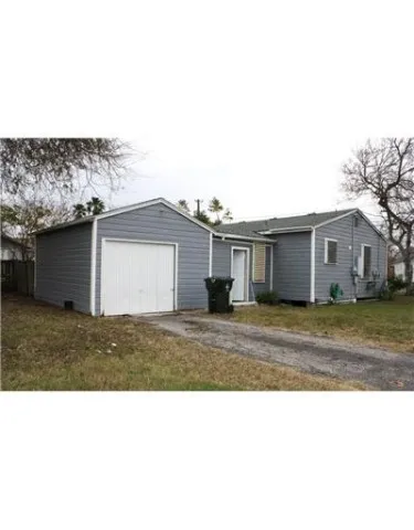 a black and white photo of a house