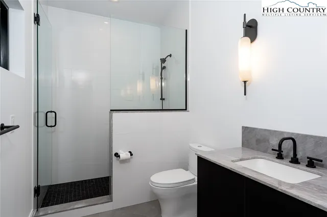 a view of balcony with wooden floor