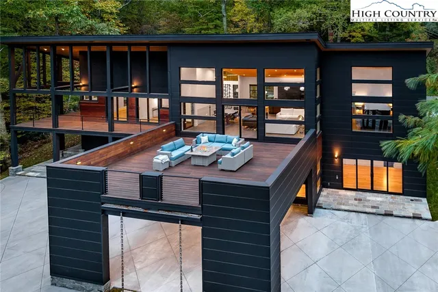 an outdoor view of the patio and swimming pool