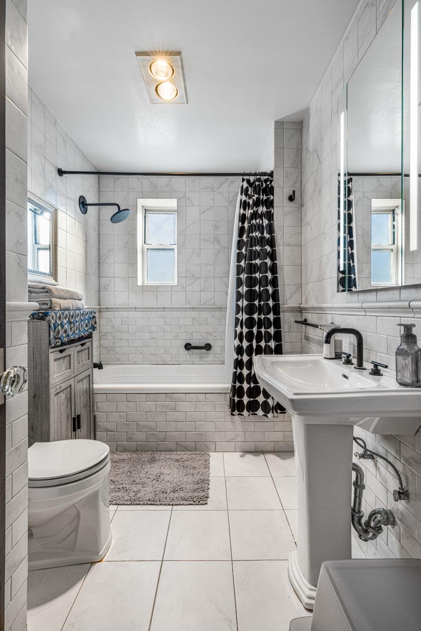 51-34 30th Avenue, Unit E6J Queens, NY 11377 - Photo 11 of 17 Bathroom