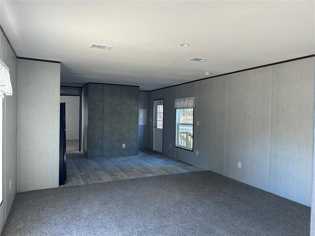 13751 Northeast 5 Street Williston, FL 32696 - Photo 8 of 17 a view of empty room with window