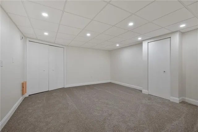 a view of a house with a roof deck