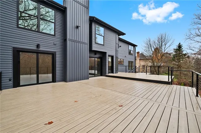 a view of wooden deck and a snow
