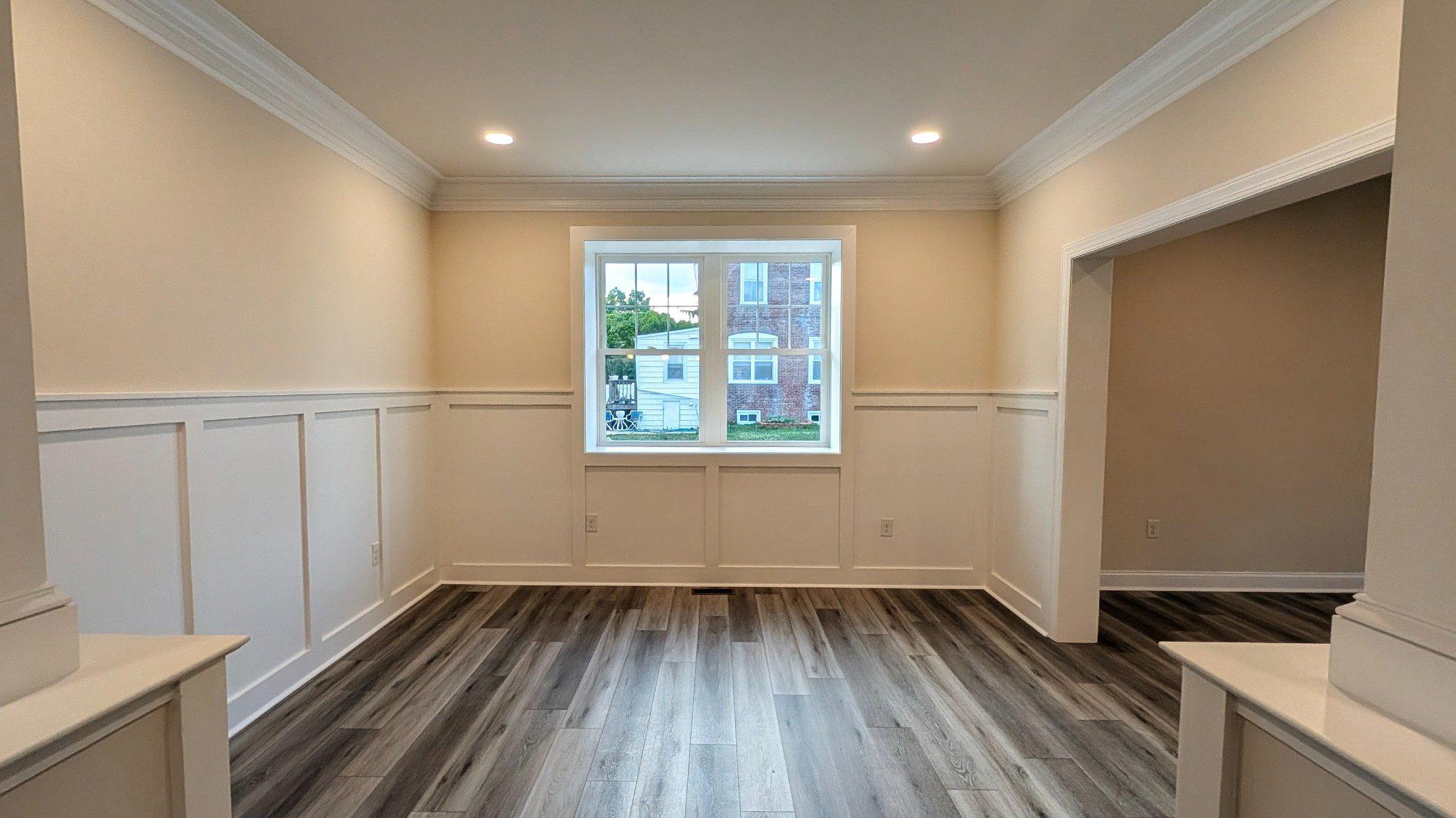 425 Rutledge Avenue Folsom, PA 19033 - Photo 10 of 33 Bright & airy DR w/ wainscoting & crown molding.