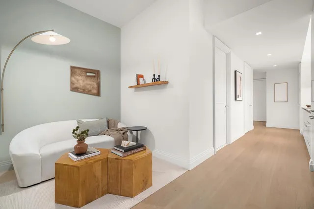 a kitchen with a sink and a stove top oven