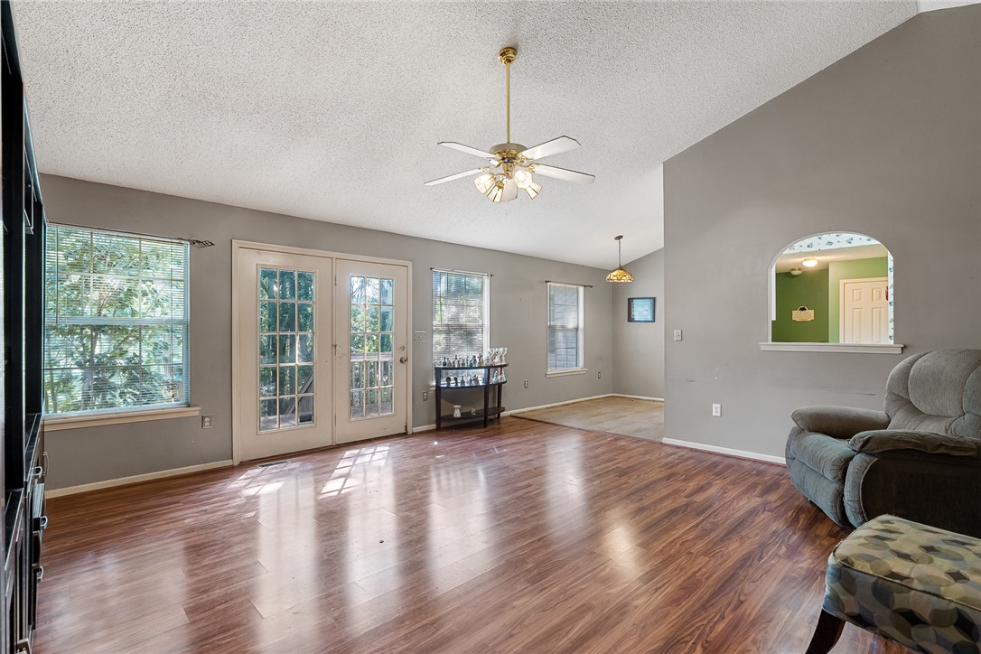 306 Lakewood Drive Anderson, SC 29621 - Photo 5 of 17 This inviting space features durable wood flooring and abundant natural light.