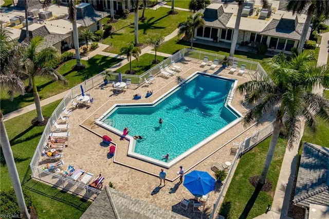 an aerial view of a house with a garden