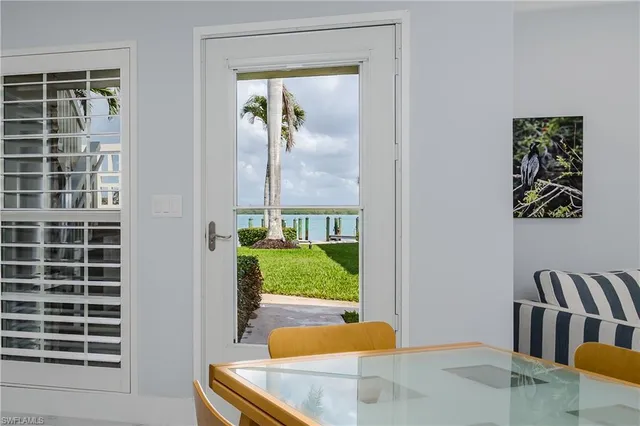 a view of a living room and a window