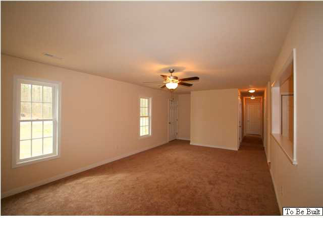 10 Winding Ridge Way Bumpass, VA 23024 - Photo 6 of 16 a living room with furniture and a chandelier