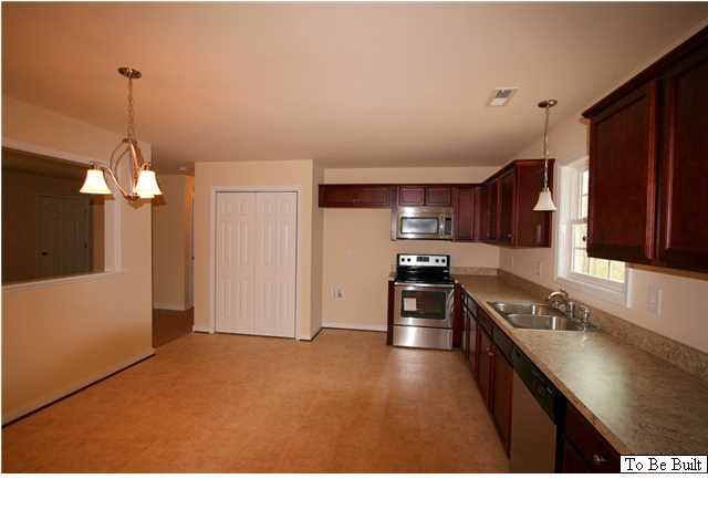 10 Winding Ridge Way Bumpass, VA 23024 - Photo 7 of 16 a kitchen with stainless steel appliances granite countertop a sink a stove and refrigerator