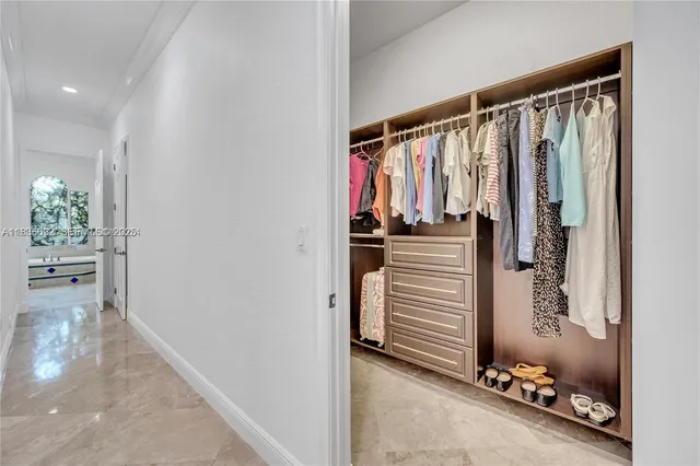 a front view of a house with garden and porch