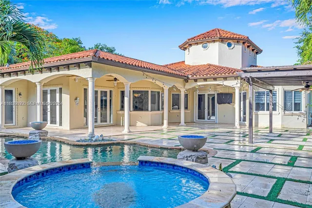 a view of a city with an ocean