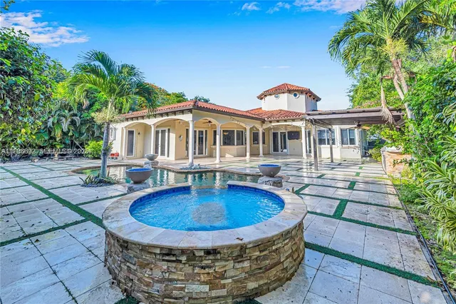 a view of a room with an outdoor space and trees